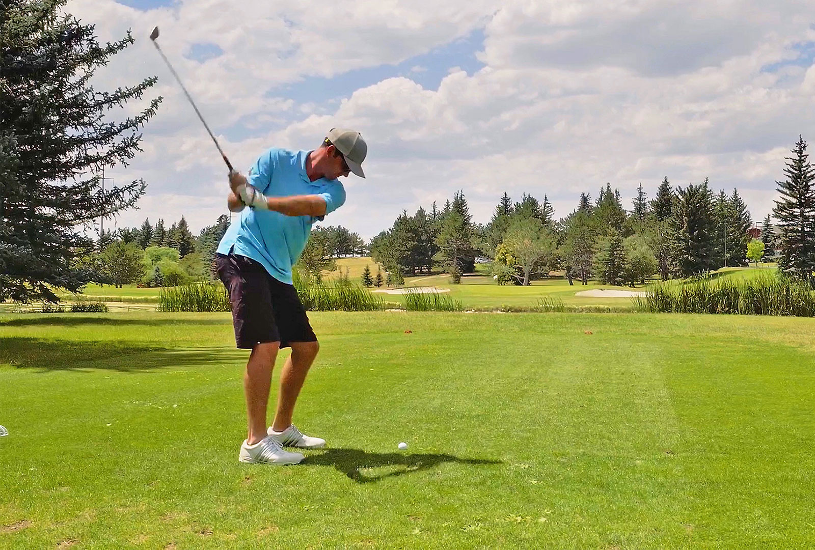 Man playing golf at Little America Cheyenne golf course