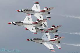 United States Air Force Thunderbirds flying in the sky.