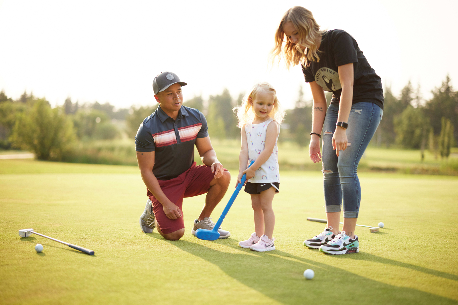 Family golfing