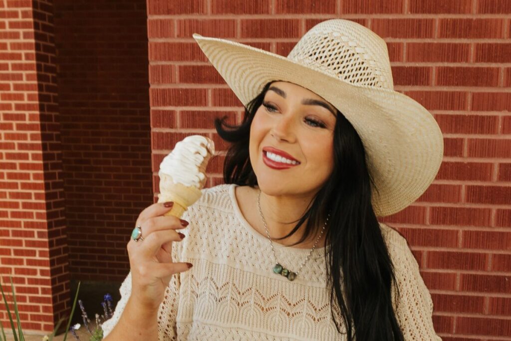 Woman eating ice cream cone